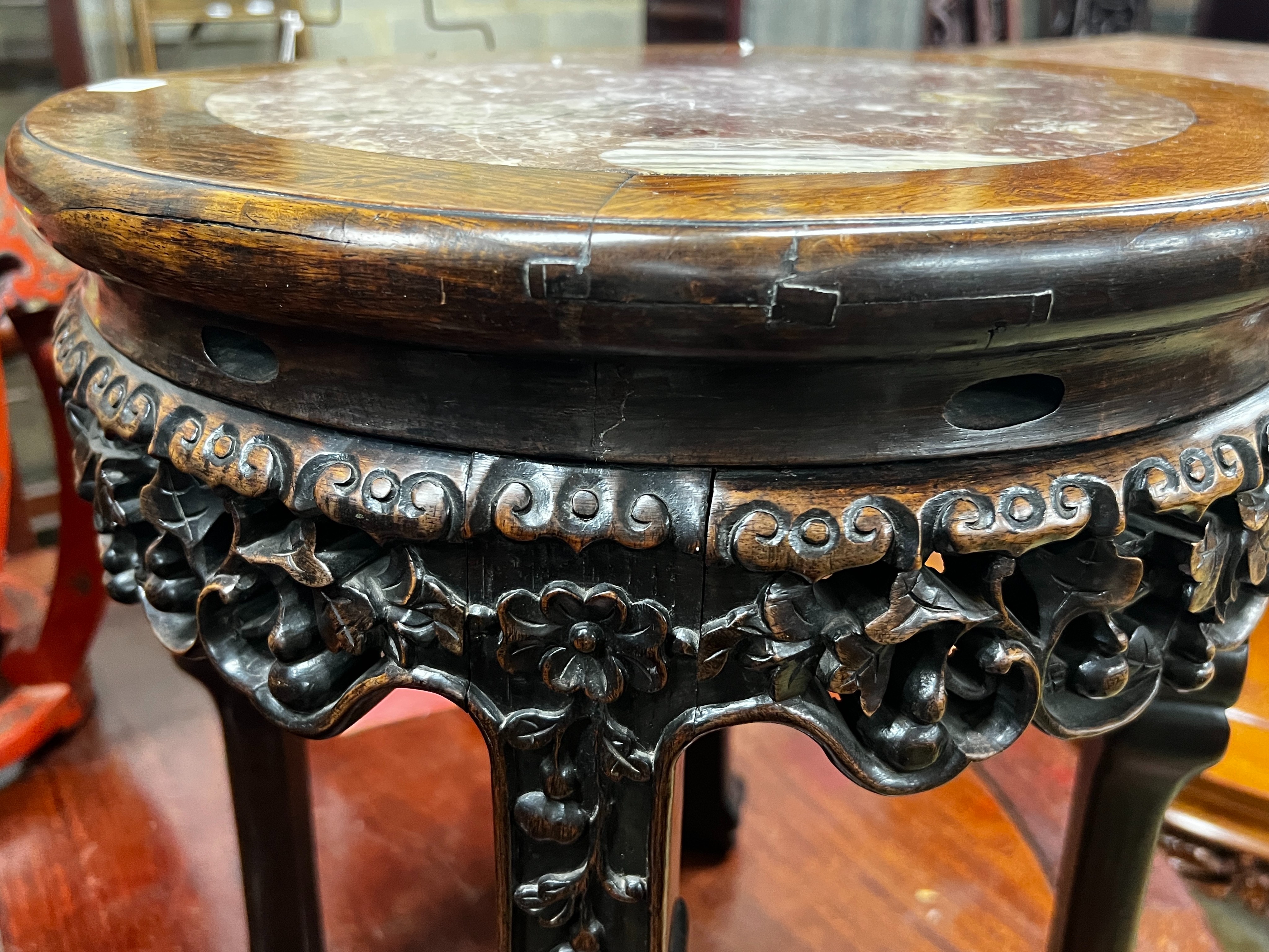 A Chinese circular marble top hongmu vase stand, diameter 41cm, height 48cm